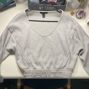 This is a brand new sweater (never worn) from Forever 21.